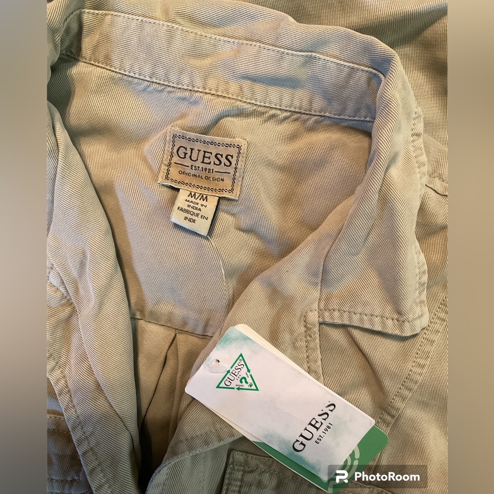 Guess jumpsuit NWT size medium inseam is 25